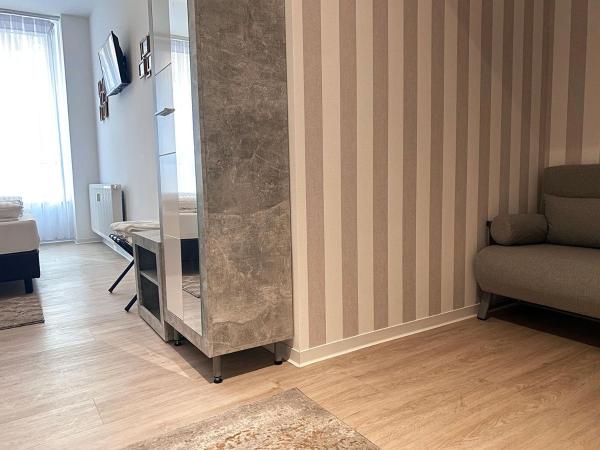 Kangarooms - Schlachte Weserpromenade : photo 5 de la chambre chambre double avec lit d'appoint