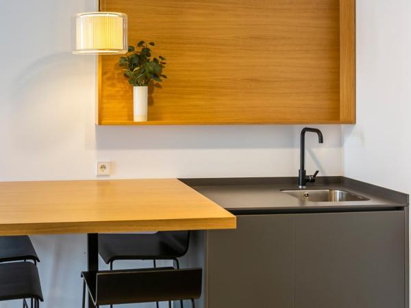 Aquitania Home Suites : photo 5 de la chambre appartement standard