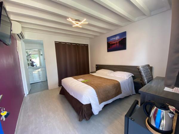 Hotel Des 4 Vents : photo 3 de la chambre bungalow (2 adultes)