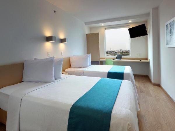 One Guadalajara Tapatio : photo 2 de la chambre chambre lits jumeaux supérieure