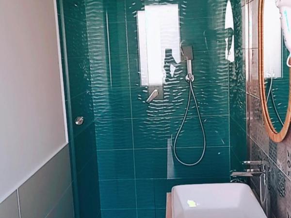 DIMENTICA IL CERVELLO : photo 3 de la chambre chambre triple avec salle de bains privative