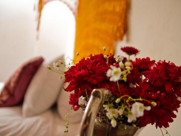 La Casa del Naranjo Hotel Boutique : photo 1 de la chambre chambre avec 2 grands lits queen-size