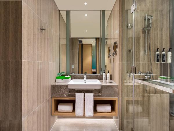 Holiday Inn Wuxi Taihu New City, an IHG Hotel : photo 1 de la chambre chambre lit king-size standard - Étage Élevé - vue sur ville