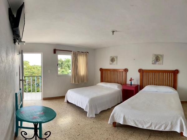 Blue Coconut Cancun Hotel : photo 8 de la chambre chambre lits jumeaux avec salle de bains privative