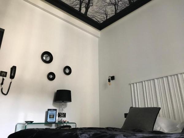 Le Grand Hôtel Mont Dore : photo 8 de la chambre chambre double - vue sur jardin