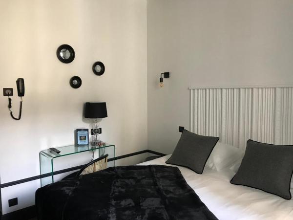 Le Grand Hôtel Mont Dore : photo 9 de la chambre chambre double - vue sur jardin