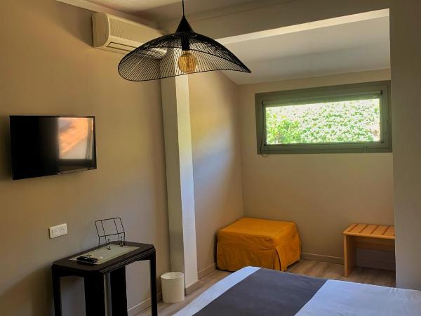 Hôtel Beau Soleil : photo 1 de la chambre chambre triple - côté colline