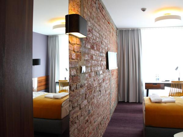 Hotel Tobaco Łódź : photo 7 de la chambre petite chambre simple