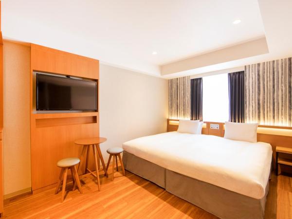karaksa hotel grande Shin-Osaka Tower : photo 2 de la chambre hébergement lit king-size double