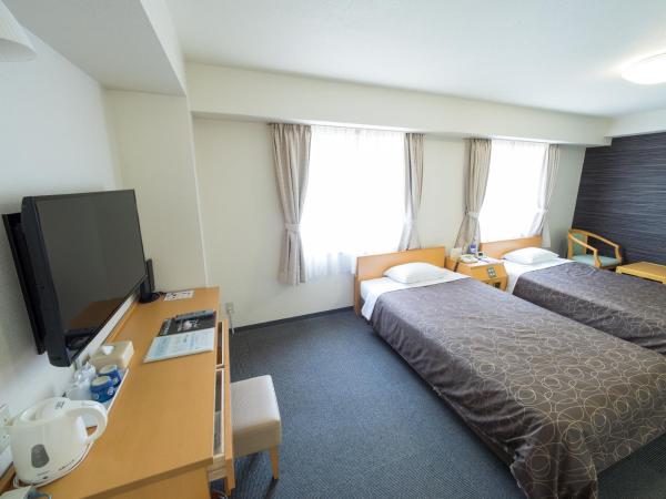 Hotel Shin Osaka : photo 4 de la chambre chambre lits jumeaux standard avec lit d'appoint - non-fumeurs