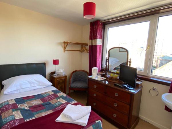 The Royal Crown Guest House : photo 3 de la chambre chambre simple avec toilettes et douche communes