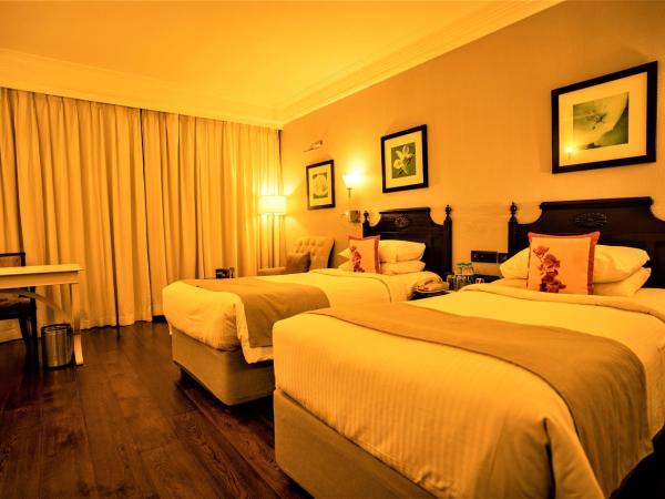 Hotel Royal Orchid Bangalore : photo 3 de la chambre chambre lits jumeaux deluxe