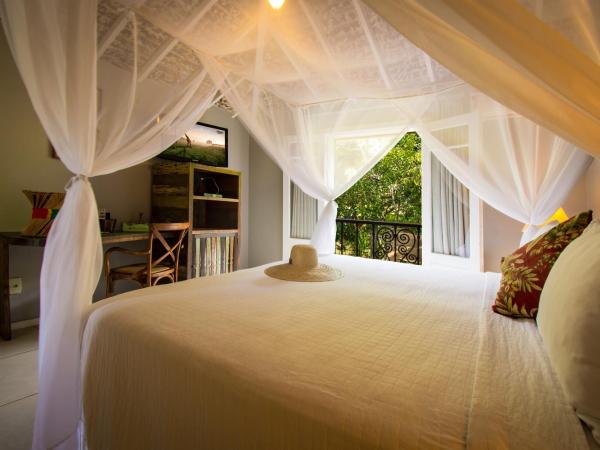 Pedra da Laguna Boutique Hotel SPA : photo 1 de la chambre chambre double deluxe - vue sur jardin