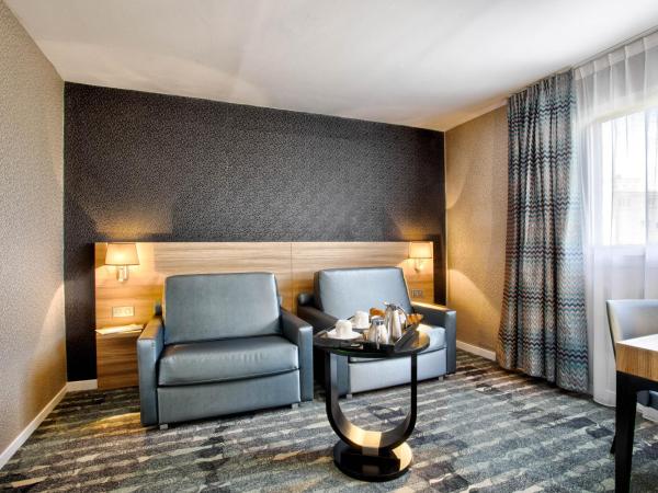 Mercure Cabourg Hôtel & Spa : photo 10 de la chambre suite privilège avec 1 lit double et 1 canapé-lit