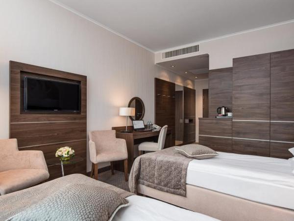 Hotel Różany Gaj - Destigo Hotels : photo 2 de la chambre chambre triple standard