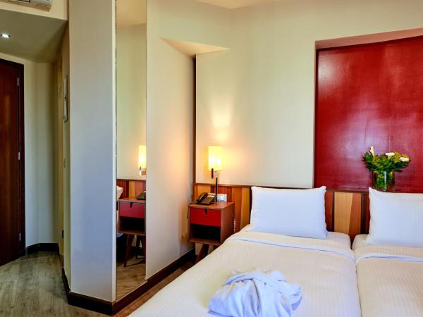 Lato Annex Boutique Rooms : photo 2 de la chambre chambre triple - vue sur ville