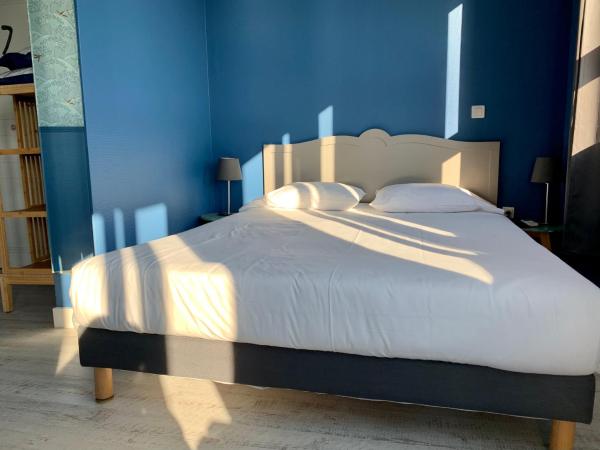 Hotel Le Petit Baigneur Palavas Plage : photo 3 de la chambre chambre double ou lits jumeaux supérieure avec vue sur ville