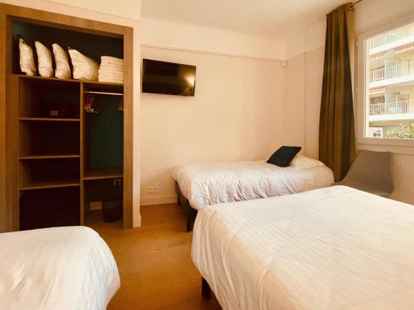 Hotel Courbet : photo 4 de la chambre chambre quadruple Économique