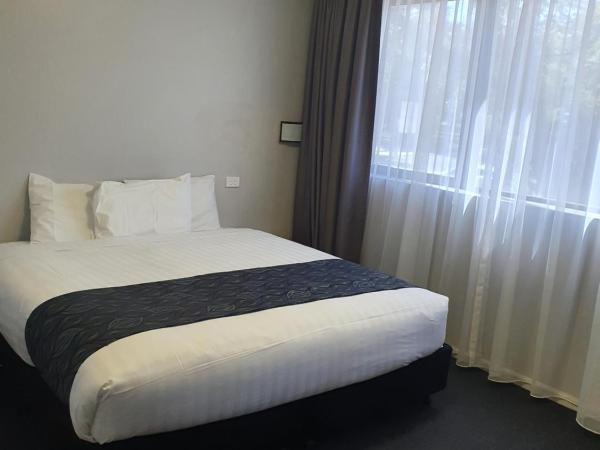 Madison Capital Executive Apartments : photo 1 de la chambre one bedroom apartment king executive – ke     