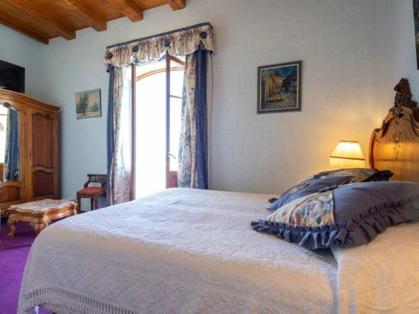 Le Château de Mei Lese : photo 2 de la chambre suite standard (4 adultes) avec balcon – vue sur mer