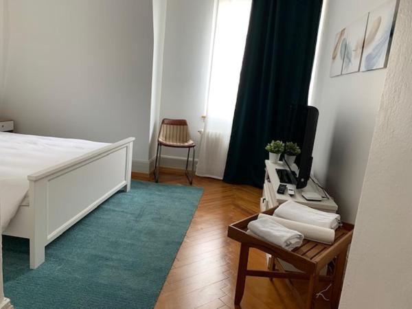 Guest House Dieci allo Zoo : photo 2 de la chambre chambre double standard avec salle de bains commune