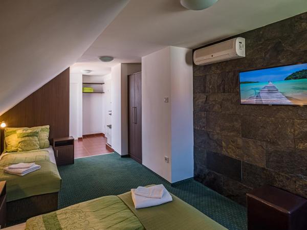 Babi Guesthouse - Babi Vendégház : photo 3 de la chambre chambre triple