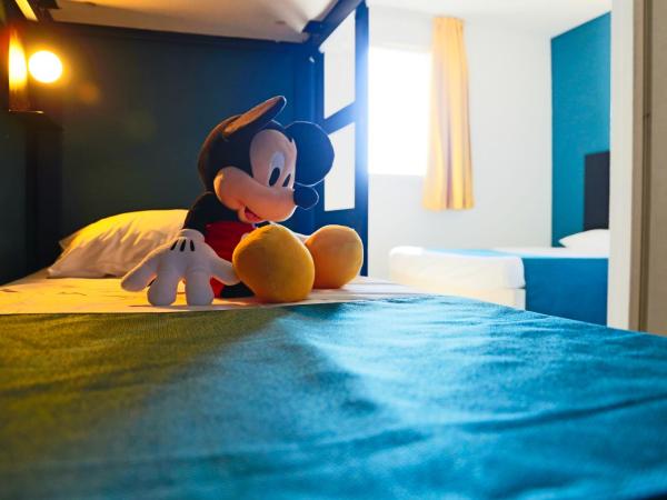 Audotel : photo 3 de la chambre chambre quadruple avec climatisation