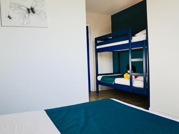 Audotel : photo 4 de la chambre chambre quadruple avec climatisation