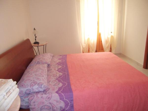 Il Giardino del Nespolo : photo 3 de la chambre chambre double - vue sur jardin