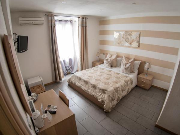 Affittacamere Lunamar : photo 5 de la chambre chambre triple avec salle de bains privative