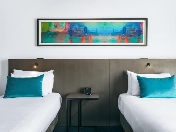 Eatons Hill Hotel : photo 2 de la chambre chambre lits jumeaux