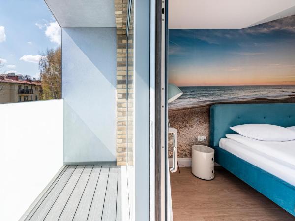 Lapwing Residence Sopot : photo 9 de la chambre appartement en duplex