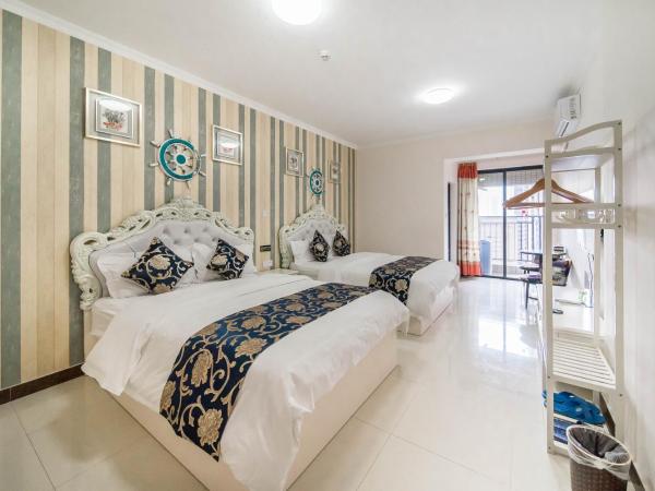 Pazhou Laiste International ApartHotel Canton Fair Complex Branch : photo 1 de la chambre chambre lits jumeaux deluxe - vue sur ville