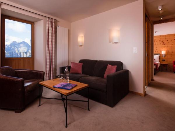 Riffelhaus 1853 : photo 1 de la chambre suite junior - vue partielle sur mont cervin