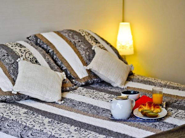 Hôtel Oxo : photo 1 de la chambre chambre triple