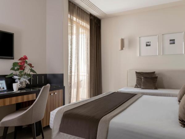 Hotel Ambasciatori : photo 1 de la chambre chambre triple deluxe