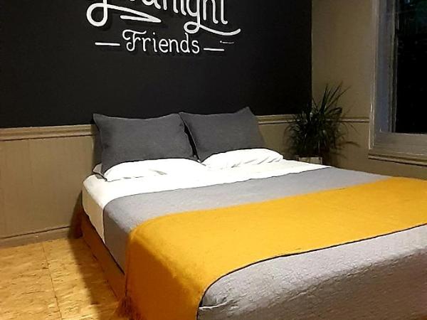 Bucanaan hostel boutique : photo 8 de la chambre chambre double ou lits jumeaux deluxe – vue sur jardin