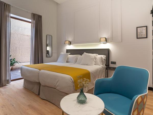 Hotel Boutique Puerta de las Granadas : photo 2 de la chambre chambre chic & terrasse (rez-de-chaussée)