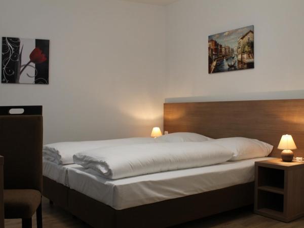 Apartment Hotel am Sand : photo 2 de la chambre chambre simple