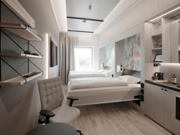 VALO Hotel & Work Helsinki : photo 1 de la chambre chambre lits jumeaux confort