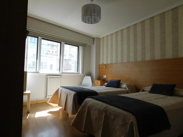 Hostal Crisol X Liste Station : photo 2 de la chambre chambre triple basique