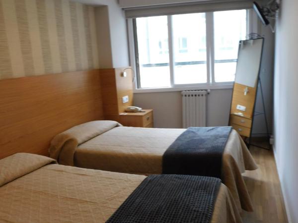 Hostal Crisol X Liste Station : photo 6 de la chambre chambre simple avec salle de bains privative