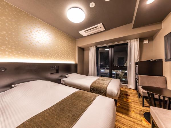 APA Hotel Shin Osaka Eki Tower : photo 1 de la chambre superior twin room -hight - floor - non -smoking
