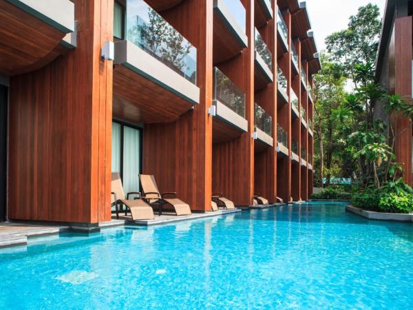 KC Grande Resort Koh Chang : photo 1 de la chambre accès à la piscine de luxe - côté colline