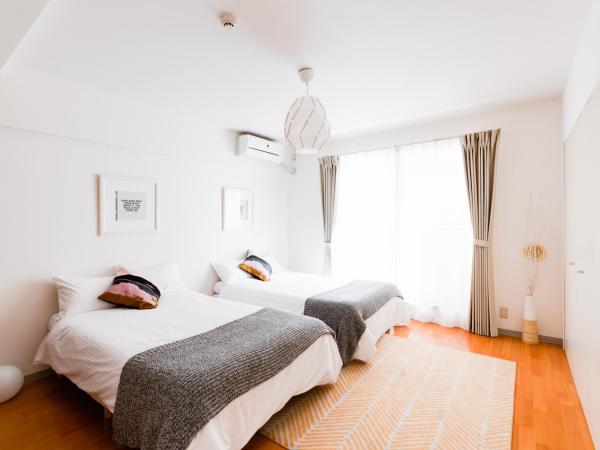 GuestHouse MIYABI : photo 1 de la chambre chambre lits jumeaux avec salle de bains privative