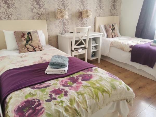 Adams Guest House : photo 1 de la chambre chambre lits jumeaux