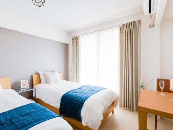 GuestHouse MIYABI : photo 2 de la chambre chambre lits jumeaux avec salle de bains privative