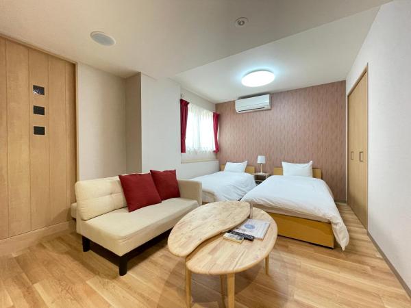 Guest House Laule'a Tennoji : photo 1 de la chambre chambre lits jumeaux standard