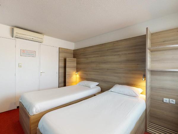 Everhotel route64 Tarbes-Ibos : photo 2 de la chambre chambre lits jumeaux