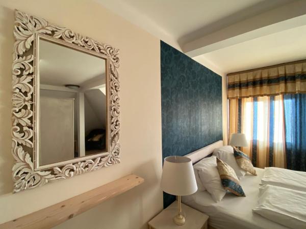 Pension Rainbow*** : photo 1 de la chambre chambre triple confort avec douche